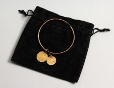 A 1901 UNITED STATES OF AMERICA GOLD COIN and a George III Gold coin 1809 on a bracelet. (2).