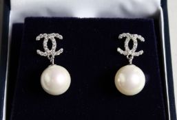 A PAIR OF 'CC' PEARL DROP EARRINGS