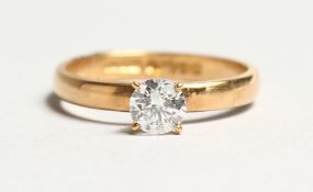 AN 18CT GOLD SOLITAIRE DIAMOND RING