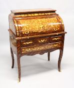A FRENCH STYLE MARQUETRY ROLL TOP DESK, with fitted interior, three small and one long drawer on