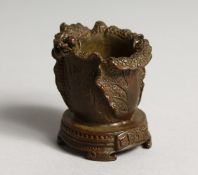 A SMALL JAPANESE CAULDRON AND INSECT. 1.75ins