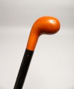 A BAKELITE GOLF CLUB WALKING CANE 2ft 11ins long