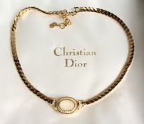 A CHRISTIAN DIOR 1980'S GILT NECKLACE in a Christian Dior bag