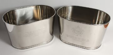 A PAIR OF PLATED OVAL WINE COOLERS 17ins long x 10ins high.