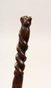 A FOLK ART PIG WALKING STICK 36ins long