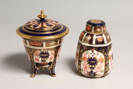 A ROYAL CROWN DERBY JAPAN PATTERN CIRCULAR VASE AND COVER. No. 15838 & 1128, 4.25ins high and a