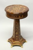 A FRENCH STYLE MARQUETRY INLAID DRUM TABLE on an hexagonal column with shaped base and ormolu