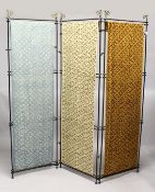 AN UNUSUAL WROUGHT IRON THREE SECTION FOLDING DRESSING SCREEN, each section having different hanging