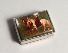 A SILVER AND ENAMEL SNUFF BOX, the lid decorated with figures on horseback. 1.5ins wide