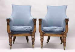 A VERY GOOD PAIR OF WILLIAM IV ROSEWOOD FRAMED BERGERE CHAIRS with blue padded upholstery and