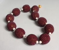 POSSIBLY ROMAN, A ELEVEN BEAD AND PEARL NECKLACE