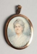 AN OVAL MINIATURE OF A LADY