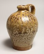 A ROMAN TYPE POTTERY JUG, See inscription on base 5.5ins high