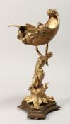 A GILT BRONZE CENTREPIECE, modelled as a classical female figure holding a conch shell. 16ins high