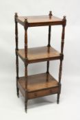 A 19TH CENTURY ROSEWOOD THREE TIER WHAT NOT, with turned columns and a small drawer, on brass