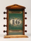 A VICTORIAN WOODEN DESK CALENDER 7ins high