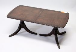 A REGENCY STYLE MAHOGANY AND LEATHER INSET TWIN PEDESTAL LOW TABLE 3ft long x 1ft 7ins wide x 1ft