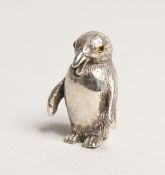 A NOVELTY CAST SLVER PENGUIN PIN CUSHION