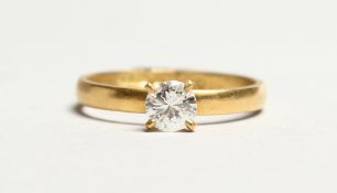 AN 18CT GOLD SOLITAIRE DIAMOND RING