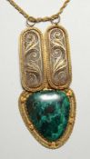 A FILEGREE AND MALACHITE PENDANT