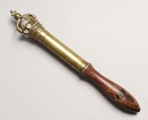 A 19TH CENTURY TURNED WOOD AND BRASS TIPSTAFF, the top asa crown with a cross. Engraved C. 19W. 6.