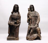 A GOOD PAIR OF 16TH /17TH CENTURY CARVED OAK RELIGIOUS FIGURES, one depicting a hooded man, a
