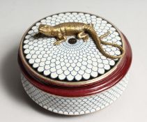 A CIRCULALR PORCELAIN BOX AND COVER with bronze lizard 5ins diameter