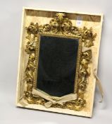 A VERY GOOD 19TH CENTURY FLORENTINE CARVED GILT WOOD MIRROR. 3ft 3ins high, 2ft 2ins wide overall.