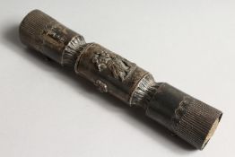 A VICTORIAN NOVELTY SILVER NEEDLE CASE SHAPED AS A CRACKER, with padded ends and opening flap 6.5ins