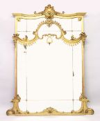 A SUPERB LARGE 19TH CENTURY GILT WOOD MIRROR, sectional mirror panels with shell and acanthus
