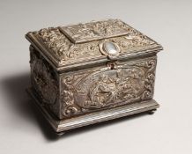 A CAST JEWELLERY BOX with blue velvet interior 5ins wide.