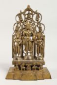 A CHINESE GILT BRONZE FIGURAL SHRINE 11ins high