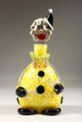 A MURANO MOTTLED YELLOW CLOWN BOTTLE AND STOPPER. 12ins high.