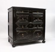 A GOOD LATE 17TH CENTURY, DARK OAK, TWO PIECE LINEN FOLD FRONT, CHEST OF FOUR DRAWERS with brass
