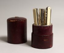 A JOSEPH ROGERS TRAVELLING CUTLERY SET in a leather case 6ins high.