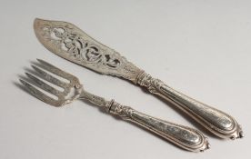 A GOOD PAIR OF PIERCED AND ENGRAVED VICTORIAN FISH SERVERS. London 1850, maker J.G.