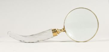 A MAGNIFYING GLASS WITH GLASS HANDLE