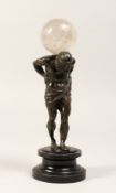 A BRONZE HERCULES with a ball on his shoulder. 9ins high.