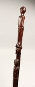 A GOOD FOLK ART CARVED WALKING STICK 38ins long