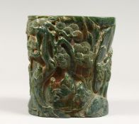 A CHINESE CARVED GREEN JADEITE BRUSH POT 6.25ins high