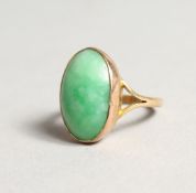 A GOLD AND JADE RING