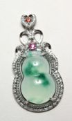 A SILVER AND JADE DOUBLE GOURD PENDANT