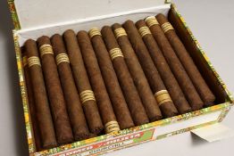 A BOX OF 25 CIGARS in a Romeo and Juliet box.
