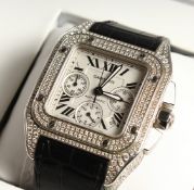 A SUPERB CARTIER DIAMOND SET AUTOMATIC WATCH and leather strap. No. 311173 C E. 2740. In original