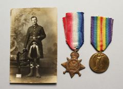 THE MEDALS OF FRANCIS DUCKETT, PTE. SCOTS. GUARDS, 8113. Wounded 7.10.14., along with a photo.