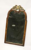 AN EARLY 18TH CENTURY WALNUT AND CARVED GILT UPRIGHT MIRROR 3ft 1ins high, 1ft 8ins wide.