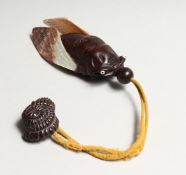 A JAPANESE CARVED WOOD AND MOTHER OF PEARL BETTLE INRO 5ins long