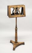 A 19TH CENTURY MAHOGANY DUET MUSIC STAND, with lyre shaped back supports on an adjustable