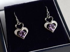 A PAIR OF SILVER AMETHYST AND DIAMOND HEART SHAPED EARRINGS
