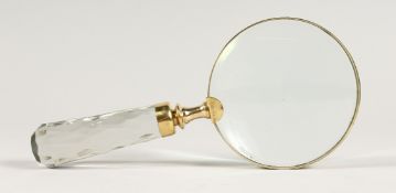 A MAGNIFYING GLASS WITH GLASS HANDLE